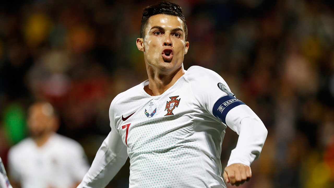 Portugal's Cristiano Ronaldo celebrates after scoring a goal against Lithuania. (Mindaugas Kulbis/AP)