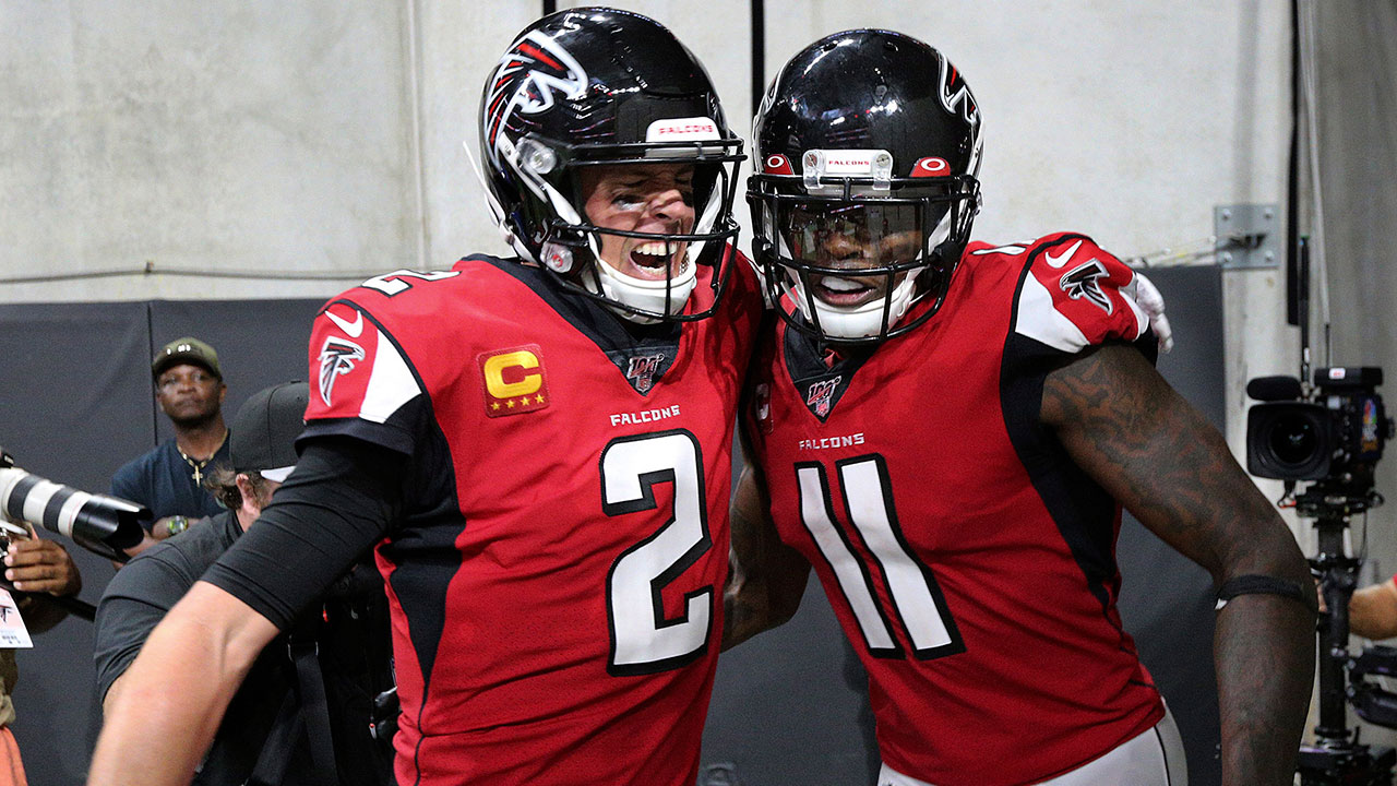 Atlanta Falcons quarterback Matt Ryan (2) celebrates with wide receiver Julio Jones (11).