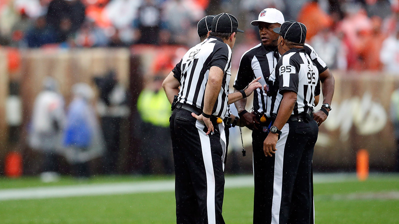 In this Sunday, Sept. 9, 2018 photo, referee Shawn Smith, second from right, and members of his crew meet for a conference during a game between the Pittsburgh Steelers and the Cleveland Browns in Cleveland. (Jeff Haynes/AP)