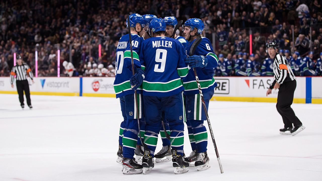 Canucks use big first period to crush visiting Pan