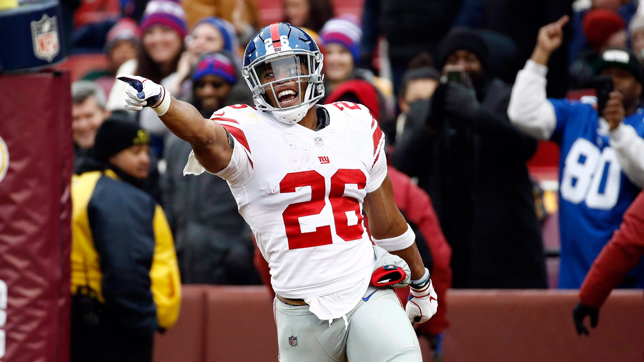 New York Giants running back Saquon Barkley (26) celebrates a touchdown. (Patrick Semansky/AP)