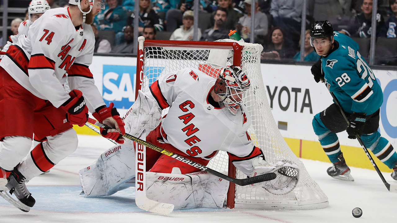 hurricanes-james-reimer-blocks-shot-against-sharks