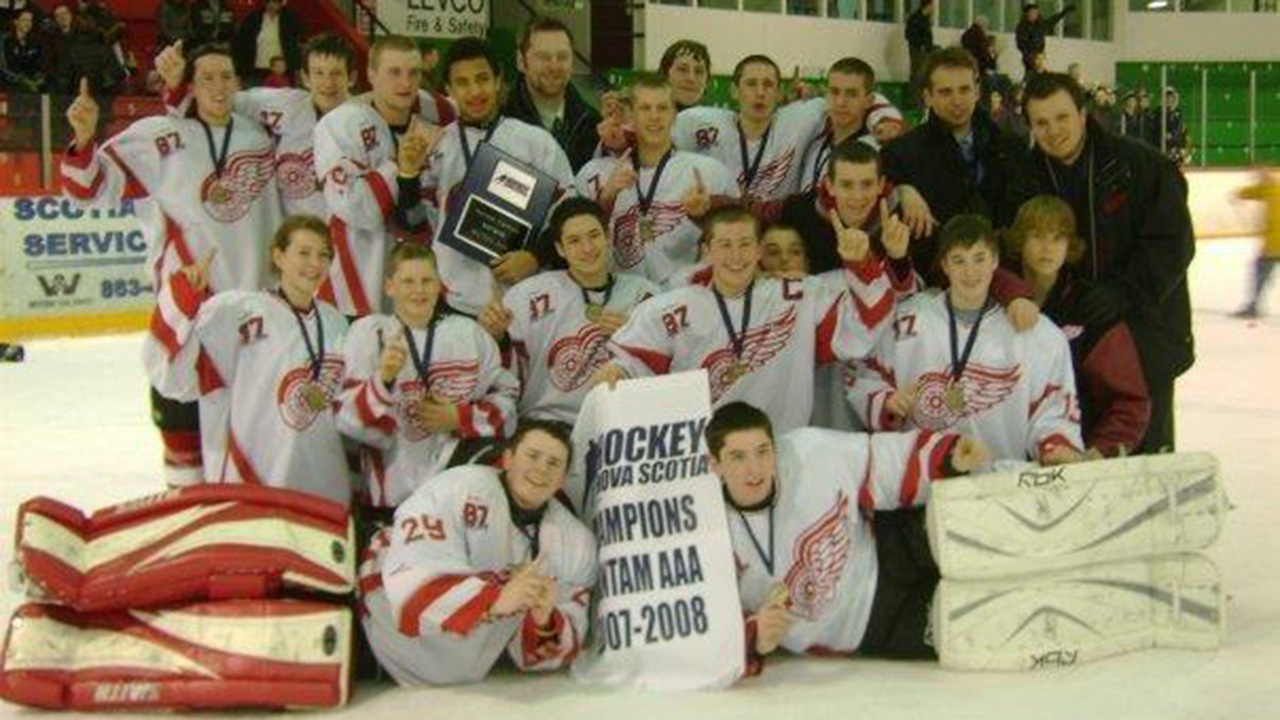 Nathan MacKinnon, second from the left behind the goalies, celebrates his bantam AAA team's provincial championship