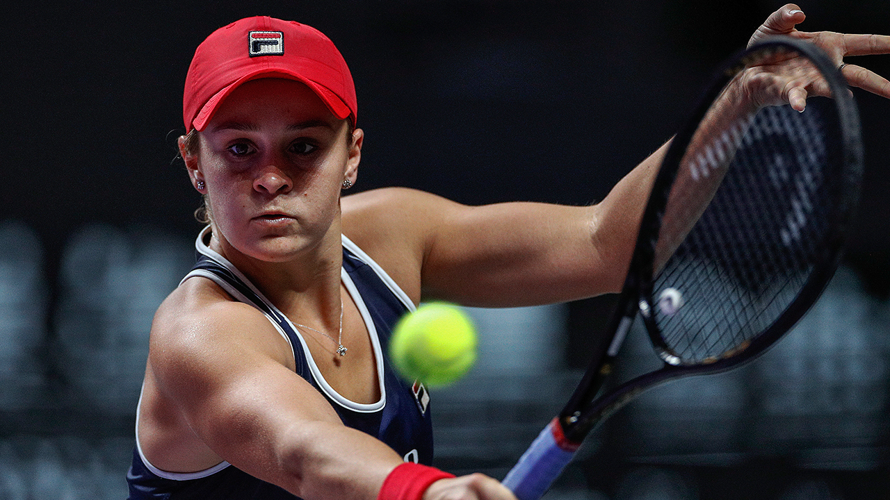 Ashleigh Barty of Australia hits a backhand shot against Karolina Pliskova of the Czech Republic during the WTA Finals Tennis Tournament at the Shenzhen Bay Sports Center in Shenzhen, China's Guangdong province, Saturday, Nov. 2, 2019. (Andy Wong/AP)