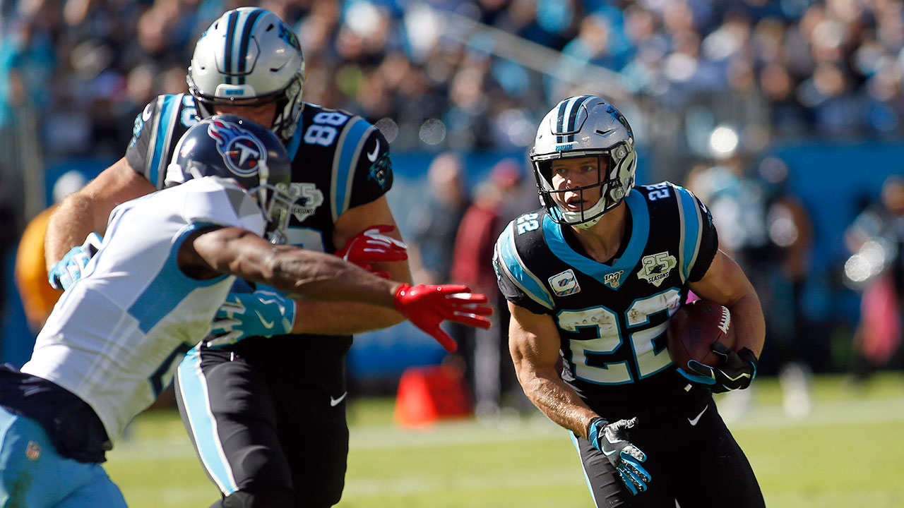 McCaffrey scores three touchdowns as Panthers beat Titans