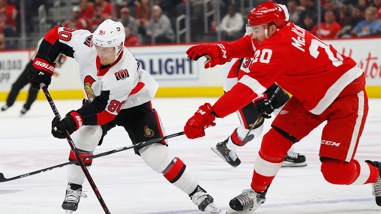 Detroit Red Wings defenceman Dylan McIlrath (20) defends against Ottawa Senators center Vladislav Namestnikov (90) in the first period of an NHL hockey game Tuesday, Nov. 19, 2019, in Detroit. (Paul Sancya / AP)