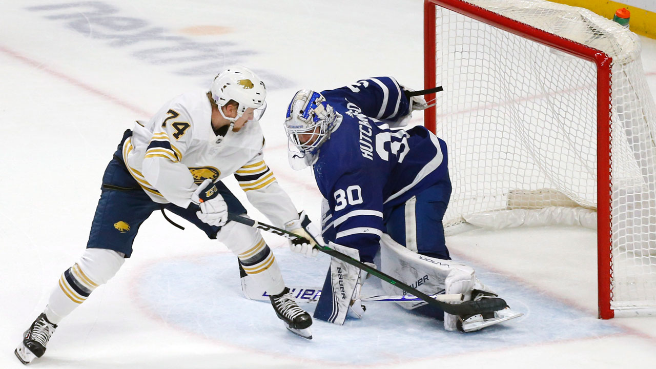 Buffalo Sabres forward Rasmus Asplund (74) is stopped by Toronto Maple Leafs goalie Michael Hutchinson (30) during the third period of an NHL hockey game Friday, Nov. 29, 2019, in Buffalo, N.Y. (Jeffrey T. Barnes/AP)