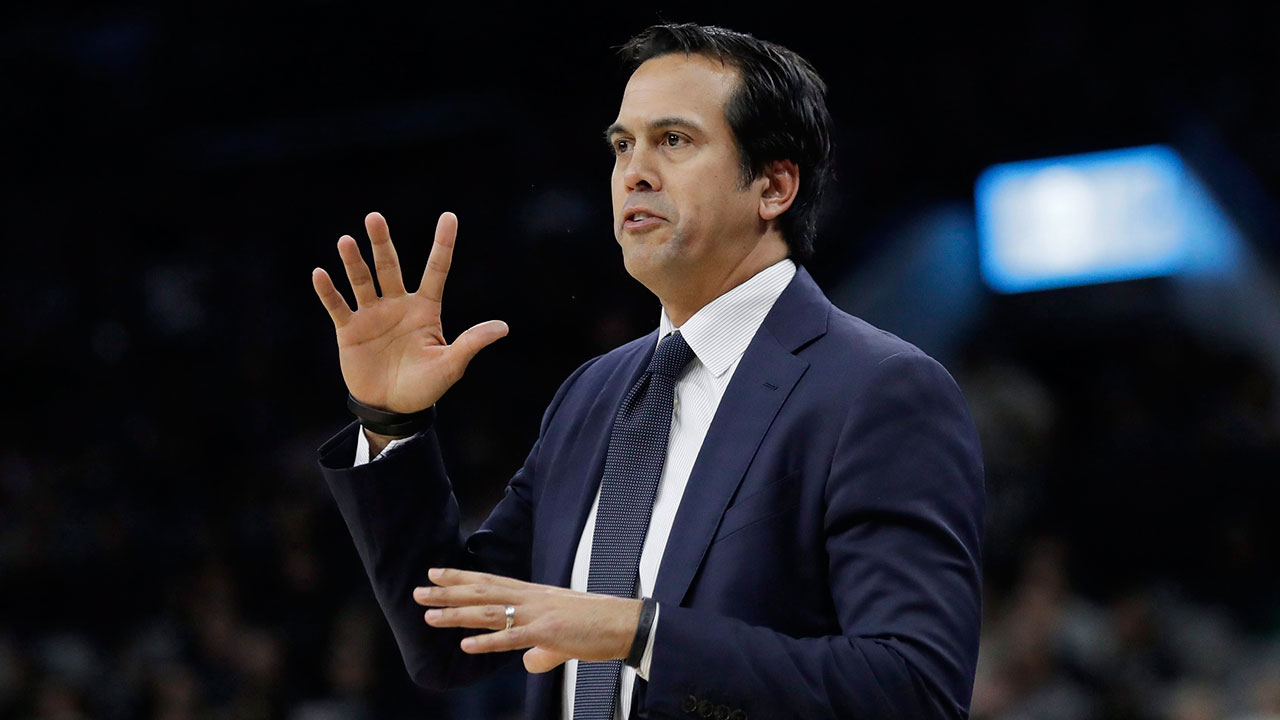 Miami Heat coach Erik Spoelstra signals to his players during the first half of an NBA basketball game against the San Antonio Spurs. (Eric Gay/AP)