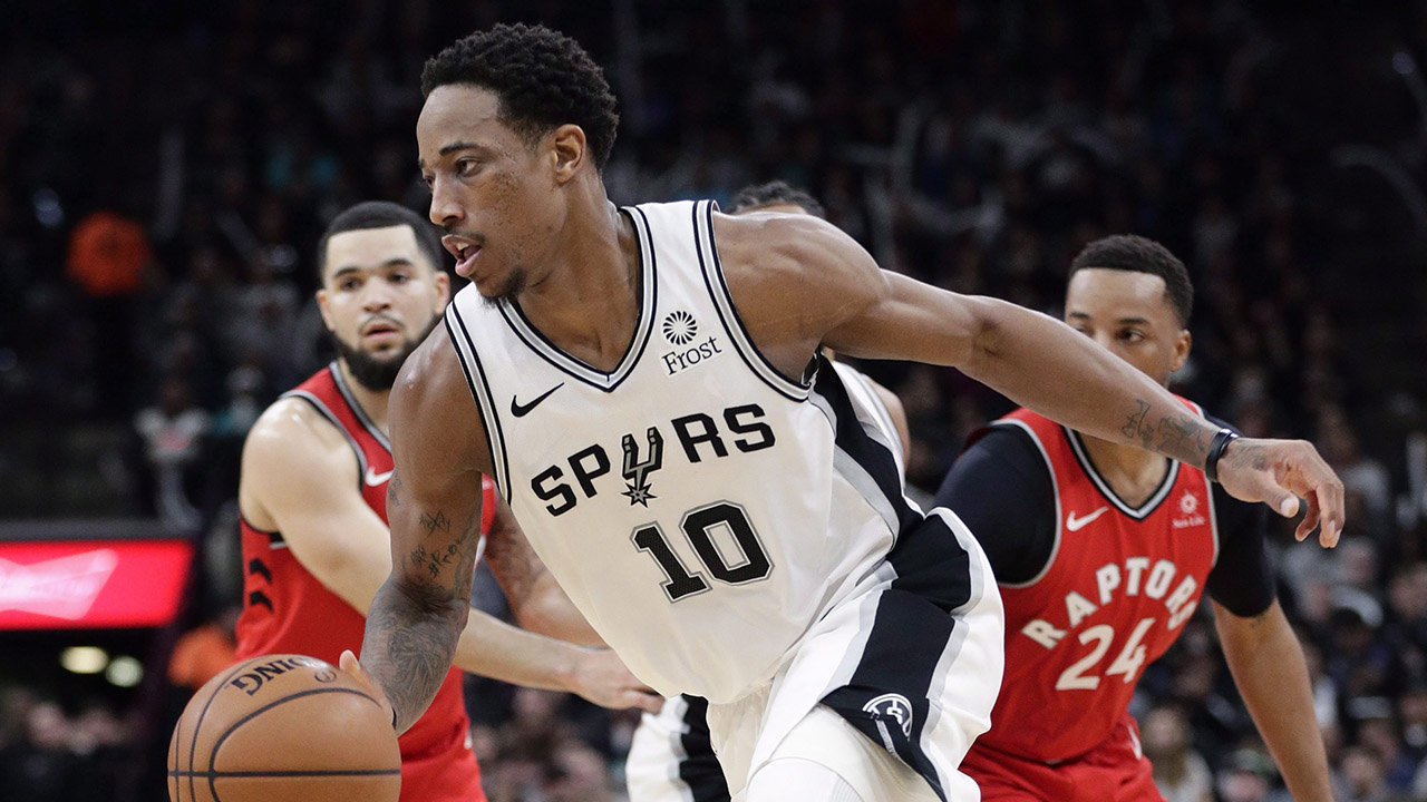 San Antonio Spurs guard DeMar DeRozan (10) drives against the Toronto Raptors. (Eric Gay/AP)