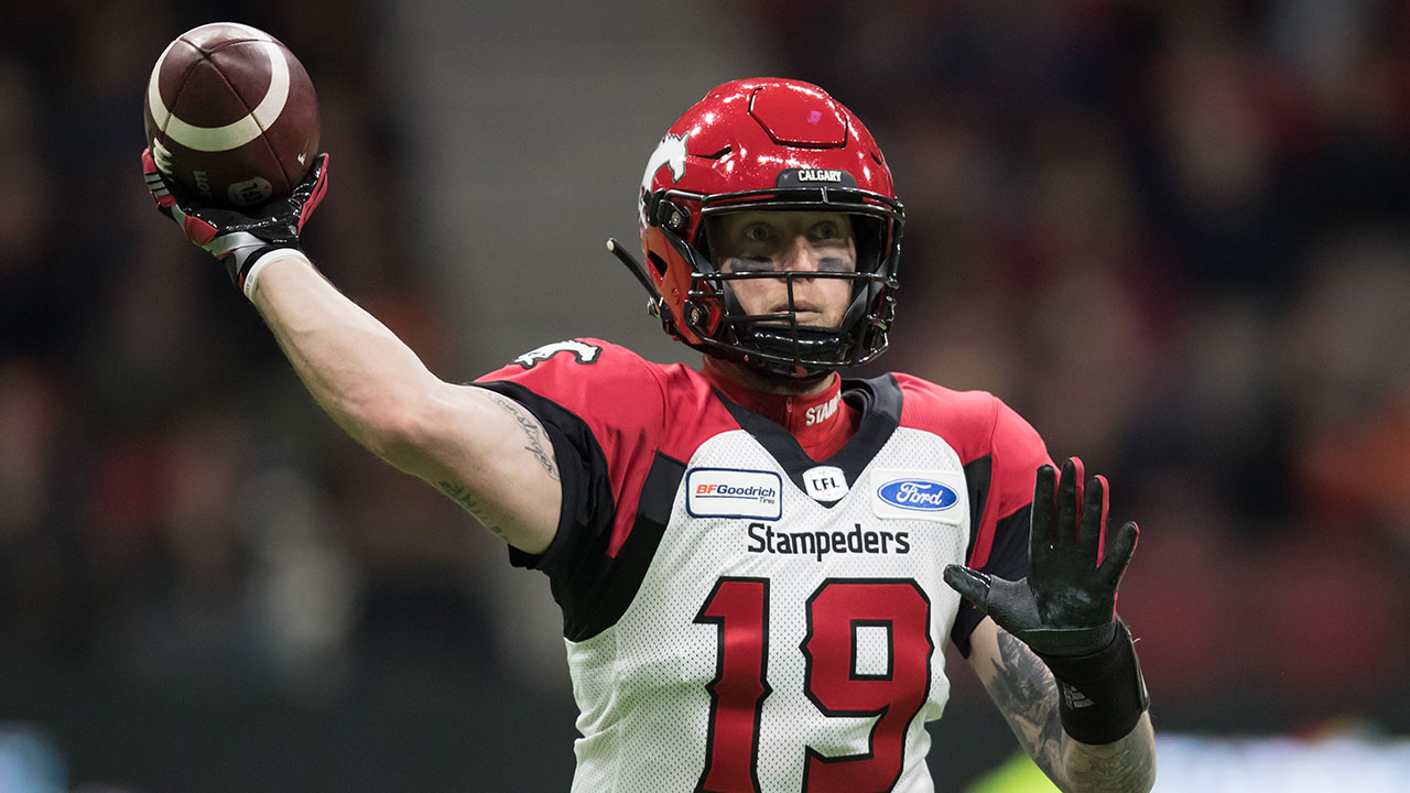 Calgary Stampeders quarterback Bo Levi Mitchell passes during first half CFL football action against the B.C. Lions. (Darryl Dyck/CP)