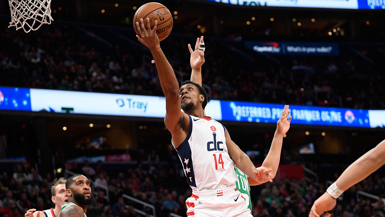 Washington Wizards guard Ish Smith (14) goes to the basket past Boston Celtics guard Carsen Edwards (4) during the first half of an NBA basketball game, Monday, Jan. 6, 2020, in Washington. The Wizards won 99-94. (Nick Wass/AP)