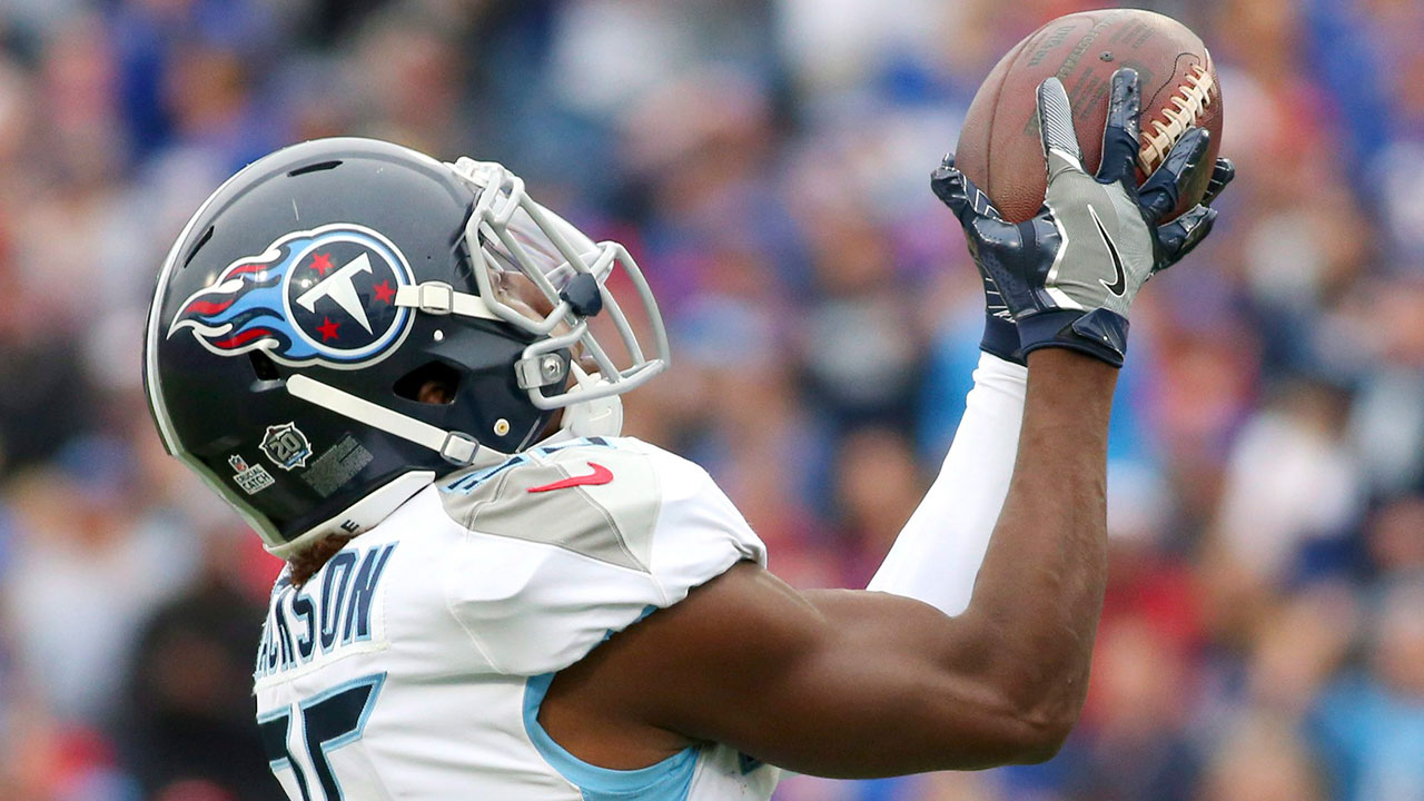 Tennessee Titans cornerback Adoree' Jackson intercepts a pass from Buffalo Bills quarterback Josh Allen during the second half of an NFL football game. (Jeffrey T. Barnes/AP) 