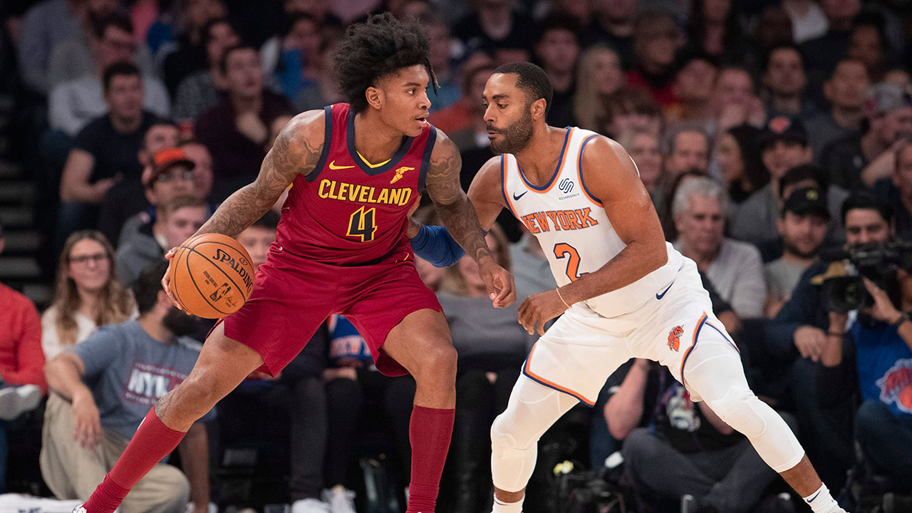 Cleveland Cavaliers guard Kevin Porter Jr. (4) is defended by New York Knicks guard Wayne Ellington (2) during the first half of an NBA basketball game. (Mary Altaffer/AP)