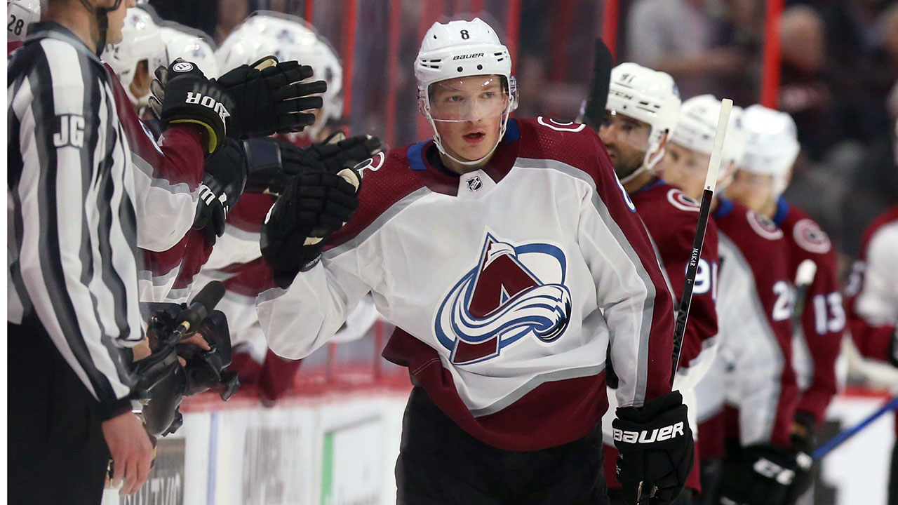 Colorado Avalanche's Cale Makar (8) celebrates his goal with teammates during second period NHL hockey action against the Ottawa Senators, in Ottawa, Thursday, Feb. 6, 2020. (Fred Chartrand/CP)