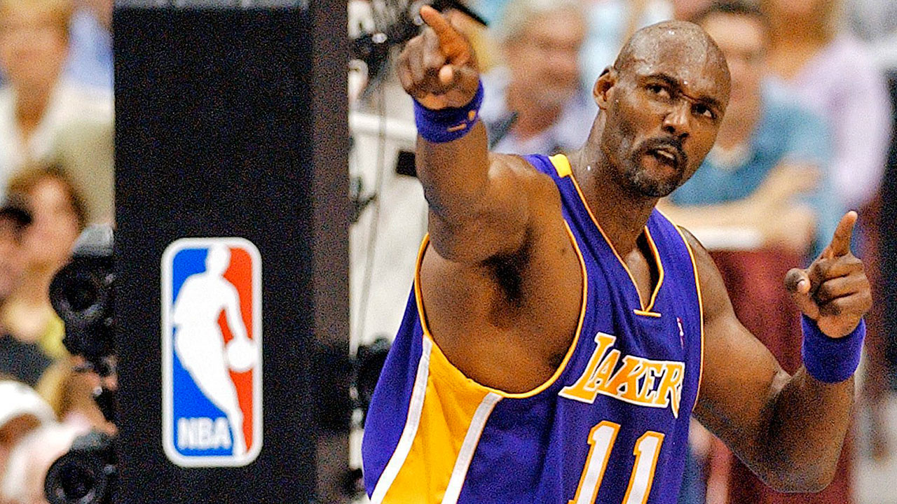 Los Angeles Lakers' Karl Malone reacts to a call in the 2004 NBA Western Conference Finals series against the Minnesota Timberwolves