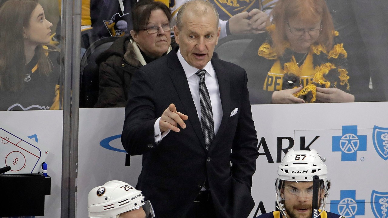 Buffalo Sabres' head coach Ralph Krueger stands behind his bench during the first period of the team's NHL hockey game against the Pittsburgh Penguins in Pittsburgh, Saturday, Feb. 22, 2020. (Gene J. Puskar / AP)