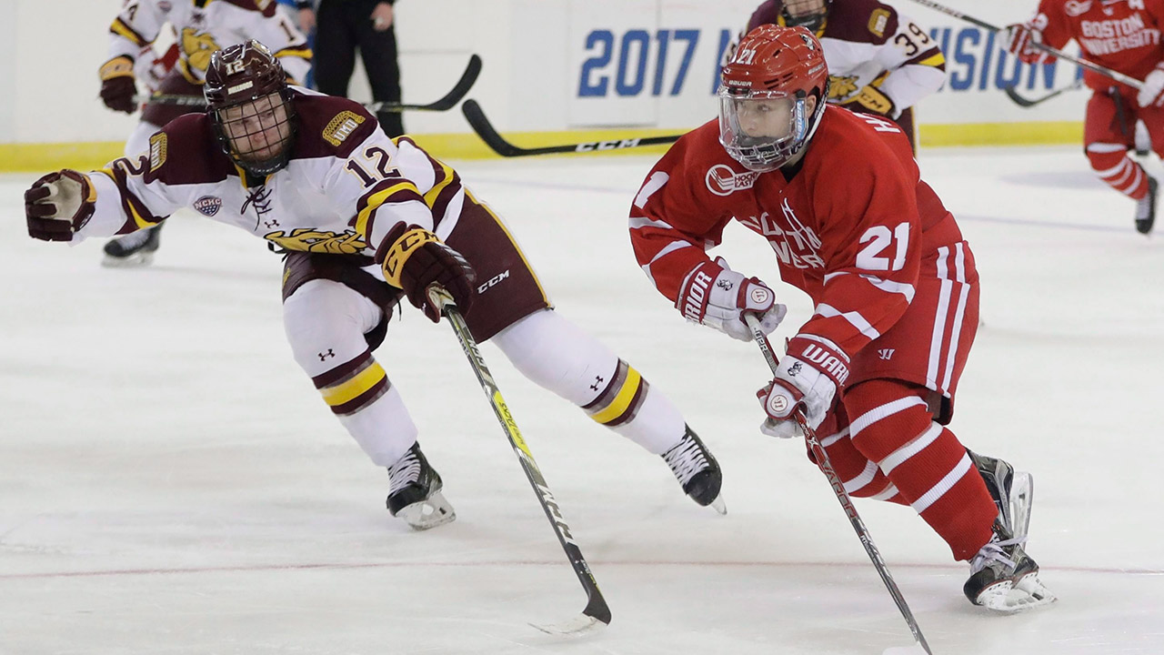 boston-universitys-patrick-harper-skates-with-puck