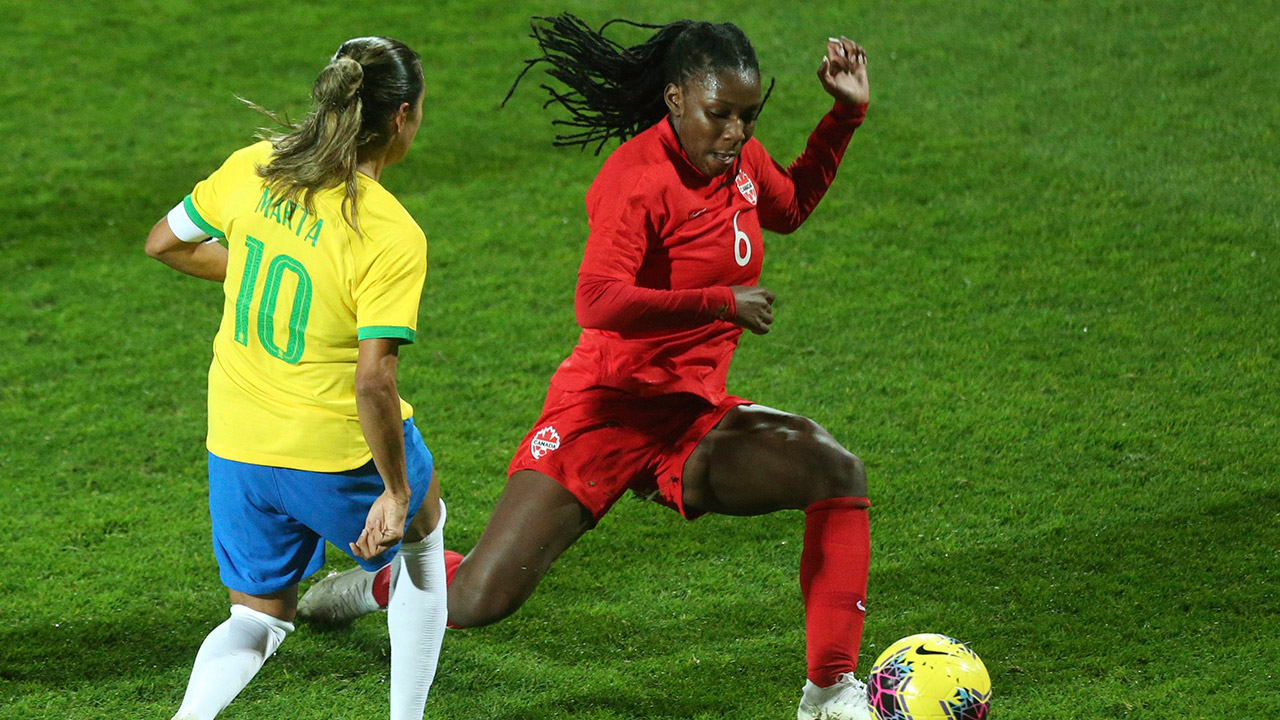 Brazil's Marta, left, and Canada's Deanne Rose compete for the ball during their International friendly match, Tuesday, March 10, 2020. (Michel Spingler/CP/AP)