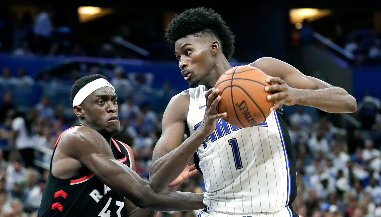 Orlando Magic's Jonathan Isaac (1) heads to the basket against Toronto Raptors' Pascal Siakam (43). (John Raoux/AP)