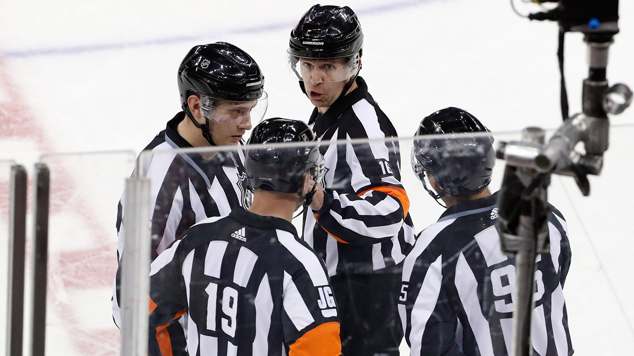 nhl-officials-reviewing-a-challenged-goal