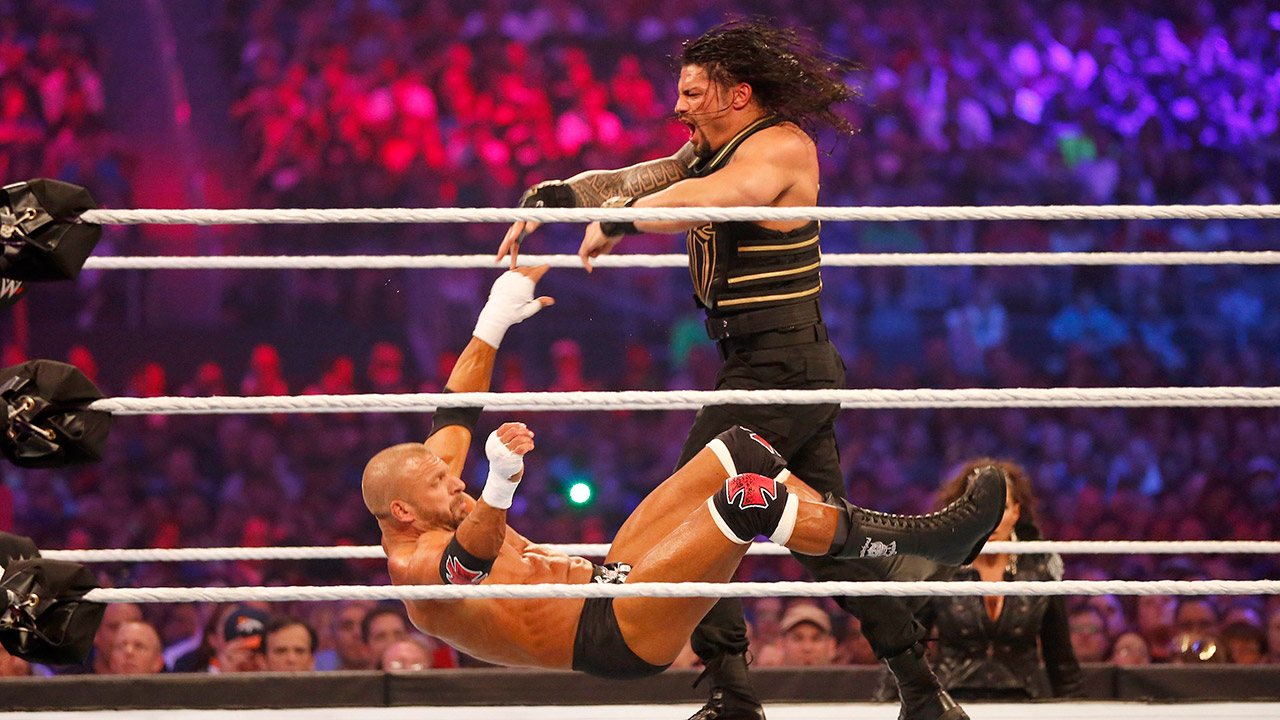 roman-reigns-knocks-down-triple-h-at-wrestlemania-32