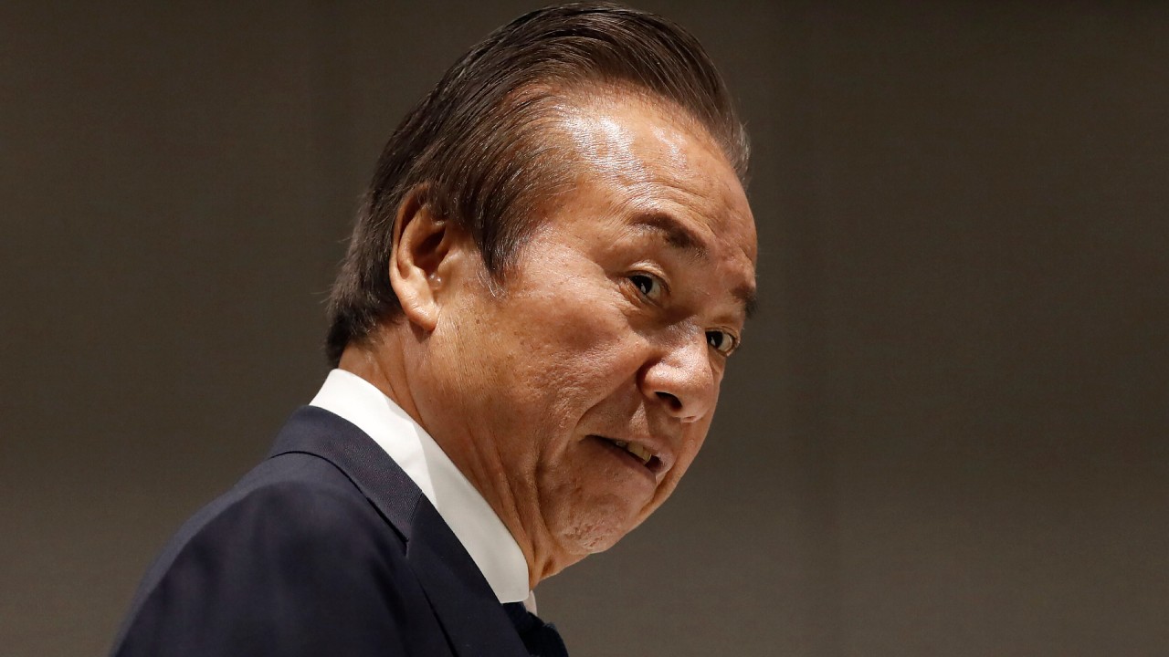 Ibn this March 30, 2020, file photo, Haruyuki Takahashi, executive board member of the Tokyo Organizing Committee of the Olympic and Paralympic Games arrives at Tokyo 2020 Executive Board Meeting in Tokyo, Japan. Takahashi says another delay should be sought if the games can't be held next year. (Issei Kato/Pool Photo via AP, File)