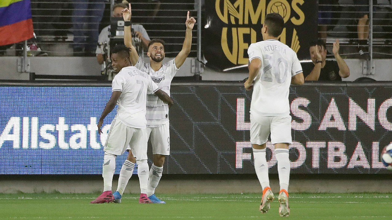 Los Angeles FC's Diego Rossi, centre, celebrates his goal with teammate Latif Blessing (7). (Marcio Jose Sanchez/AP)