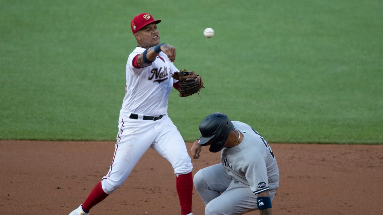 New York Yankees' Gleyber Torres, right, is out at second base as Washington Nationals second baseman Starlin Castro, left, throws to complete the double play against Yankees' Giancarlo Stanton during the first inning of a baseball game at Nationals Park, Saturday, July 25, 2020, in Washington. (Alex Brandon/AP)