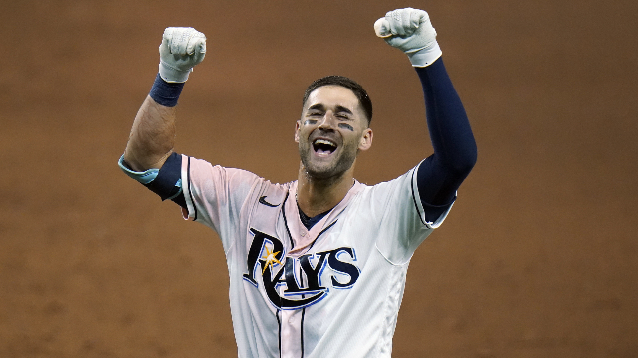 Tampa Bay Rays' Kevin Kiermaier celebrates his game-winning single off Toronto Blue Jays relief pitcher Anthony Bass during the 10th inning of a baseball game Saturday, Aug. 22, 2020, in St. Petersburg, Fla. Rays' Manuel Margot scored on the hit. (Chris O'Meara/AP)