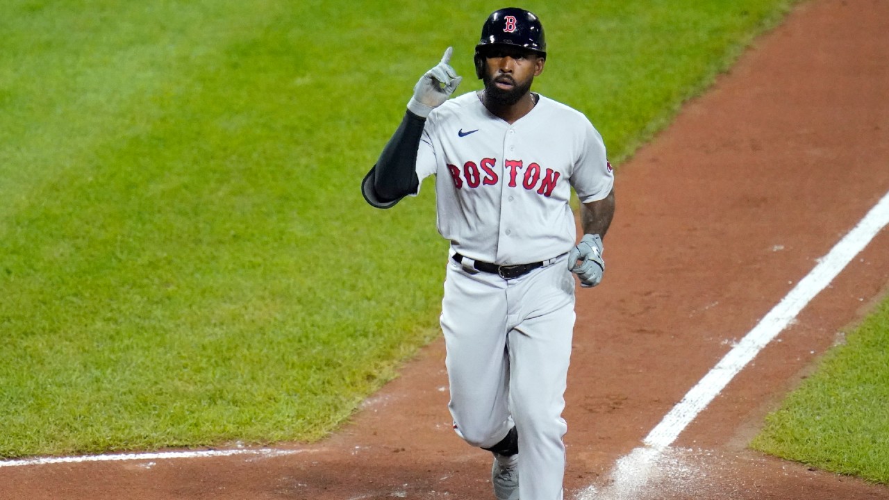 Boston Red Sox's Jackie Bradley Jr. gestures before crossing home plate after hitting a solo home run. (Julio Cortez/AP)
