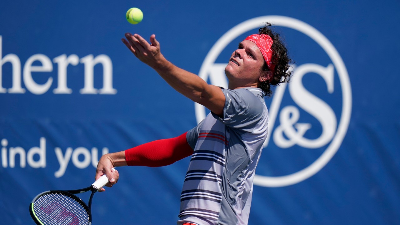 Milos Raonic serves the ball. (Frank Franklin II/AP)