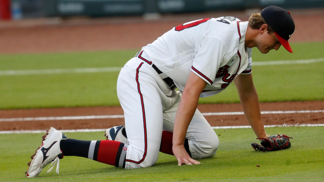 Atlanta Braves starting pitcher Mike Soroka (40) waits for assistance from the training staff after being injured in the third inning of a baseball game against the New York Mets. (John Bazemore/AP)