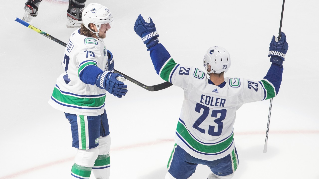 Toffoli shines in return as Canucks even series wi