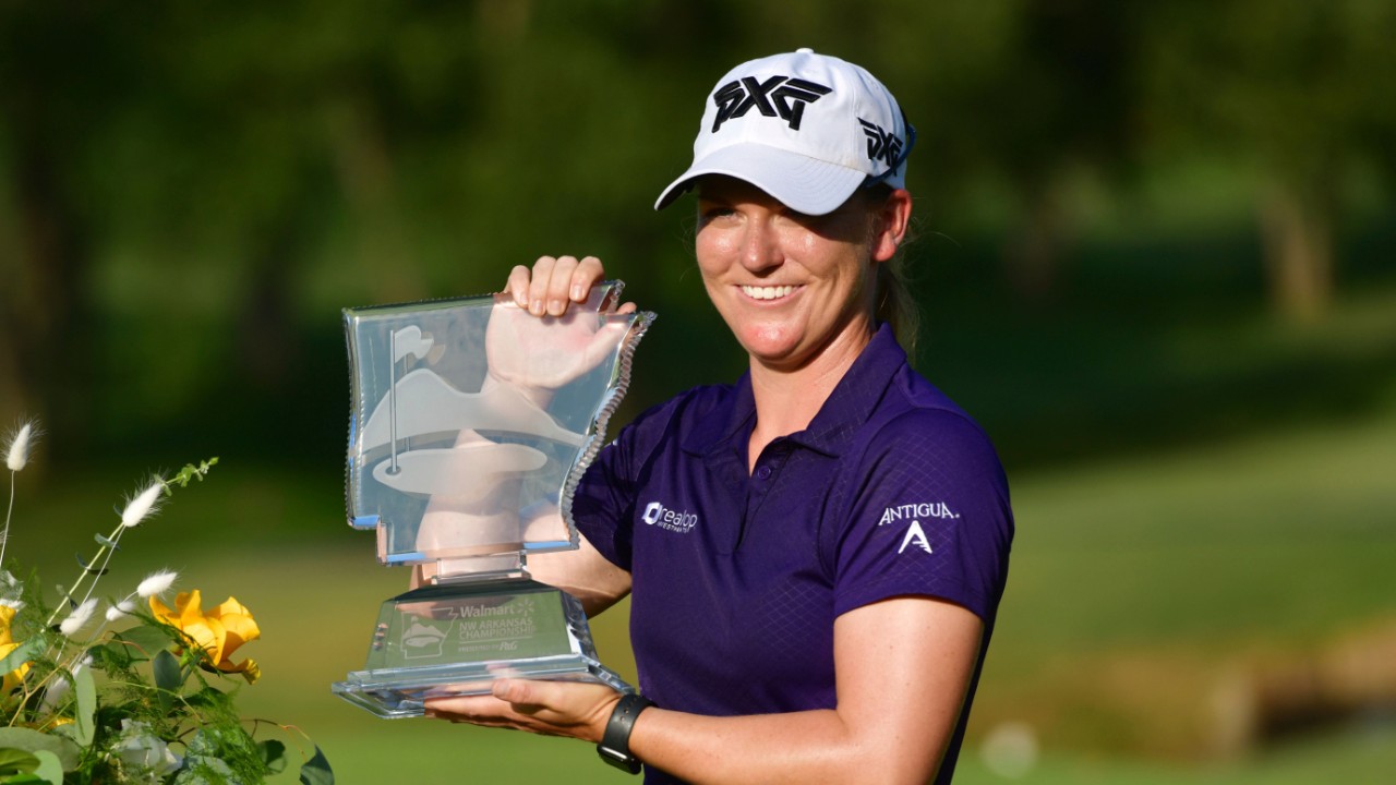 Austin Ernst holds the championship trophy after winning the LPGA Walmart NW Arkansas Championship golf tournament, Sunday, Aug. 30, 2020, in Rogers, Ark. (Michael Woods/AP)