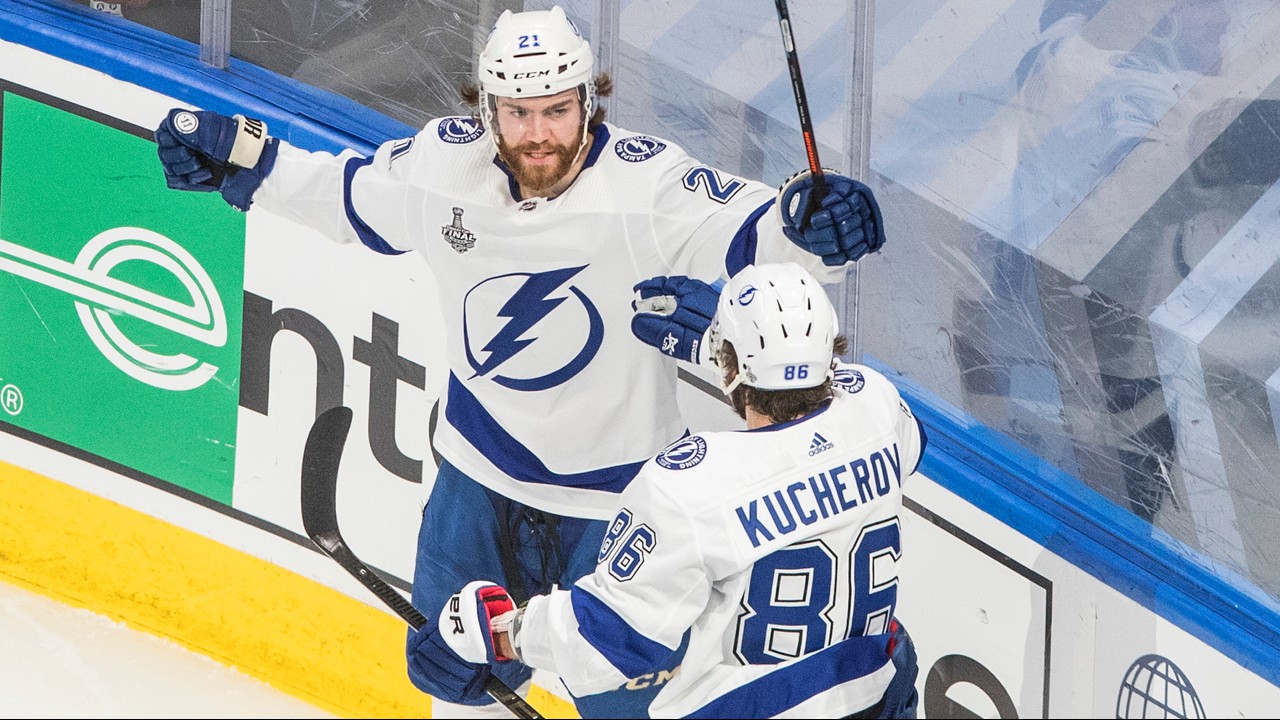 Tampa Bay Lightning centre Brayden Point (21) celebrates his goal against the Dallas Stars with teammate Nikita Kucherov (86) during second period NHL Stanley Cup finals action in Edmonton on Friday, September 25, 2020. (Jason Franson / CP)