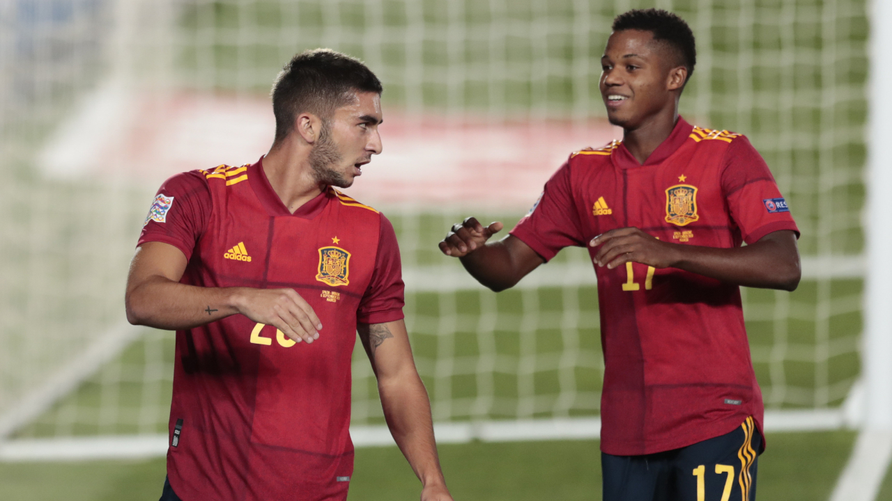 Spain's Ferran Torres celebrates with teammate Ansu Fati, right, after scoring his team's fourth goal during the UEFA Nations League soccer match between Spain and Ukraine at the Estadio Alfredo Di Stefano stadium in Madrid, Spain, Sunday, Sept. 6, 2020. (Bernat Armangue/AP)