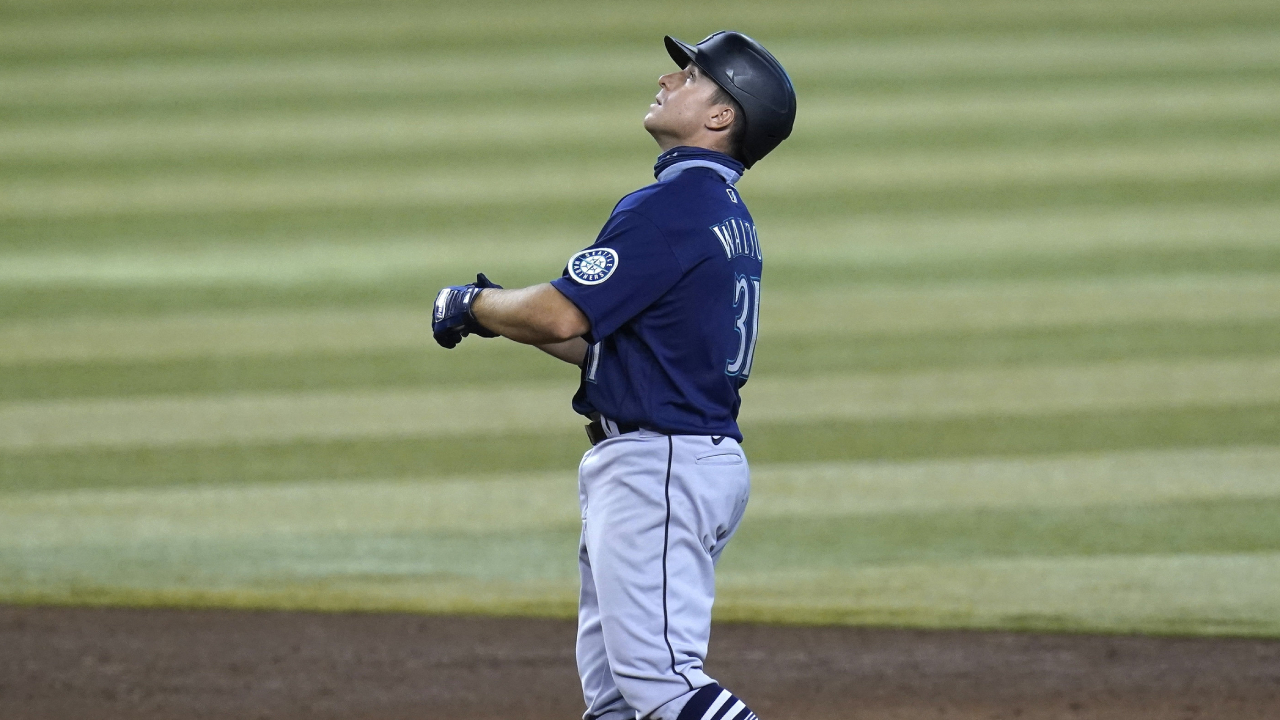 Seattle Mariners' Donovan Walton stands on second base after hitting a two-run double against the Arizona Diamondbacks during the sixth inning of a baseball game Sunday, Sept. 13, 2020, in Phoenix. (Ross D. Franklin/AP)