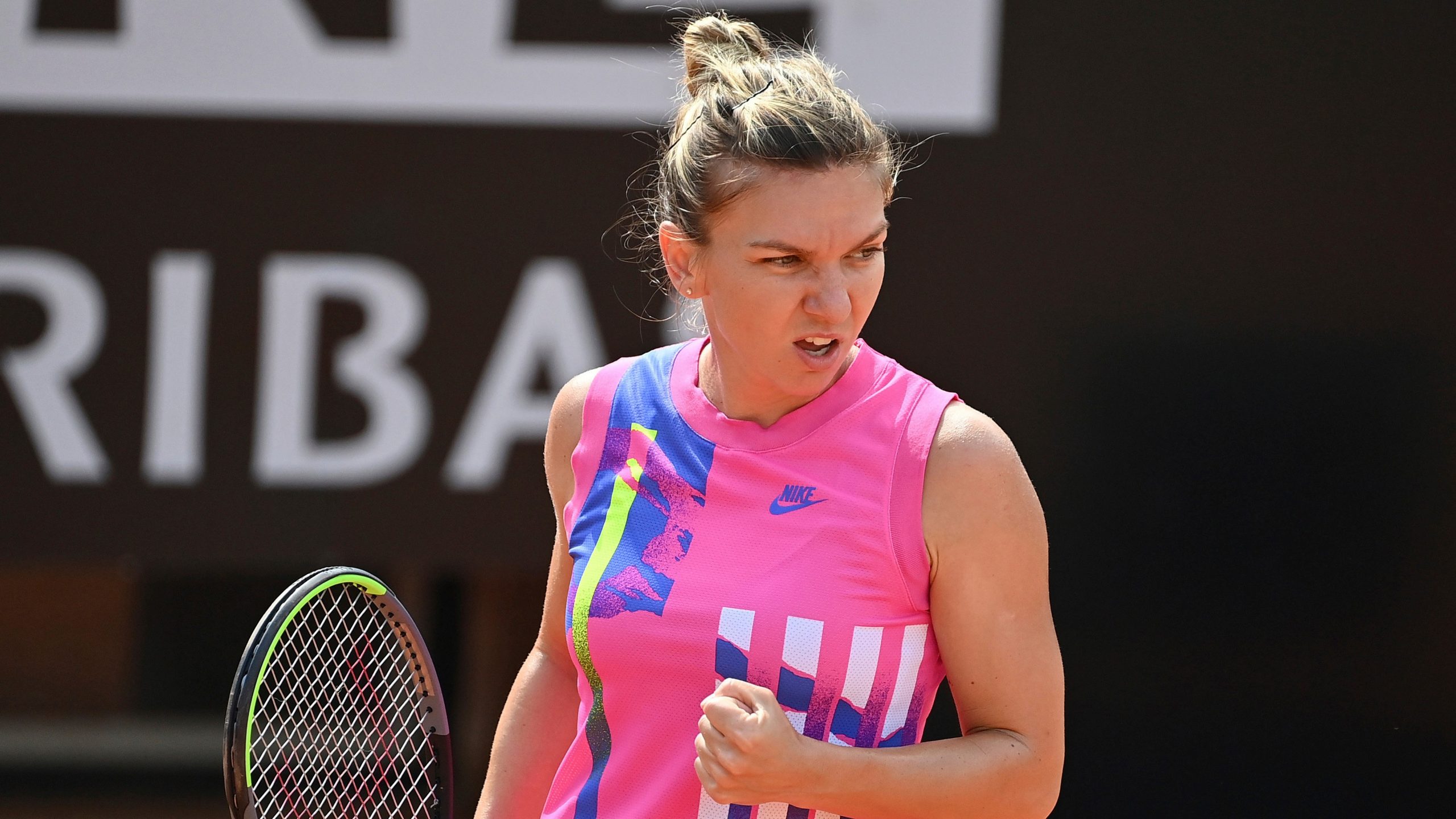 Former champ Halep reaches French Open second round, Venus Williams out