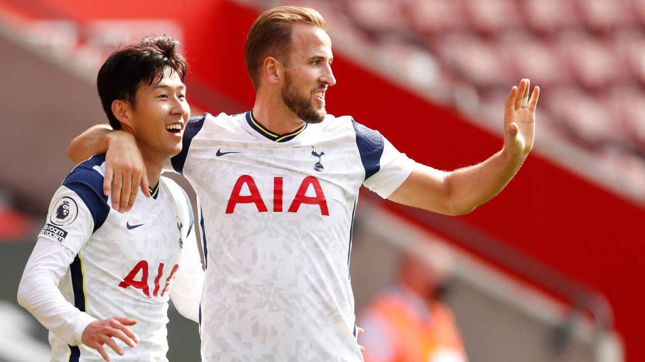 Tottenham's Son Heung-min, left, celebrates with Tottenham's Harry Kane after scoring his side's third goal during the English Premier League soccer match between Southampton and Tottenham Hotspur. (Andrew Boyers/Pool via AP)
