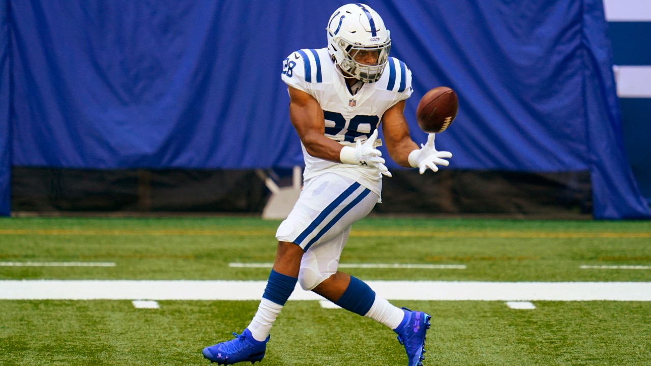 Indianapolis Colts running back Jonathan Taylor (28) makes a catch during practice at the NFL team's football training camp at Lucas Oil Stadium in Indianapolis, Monday, Aug. 24, 2020. (Michael Conroy/AP)