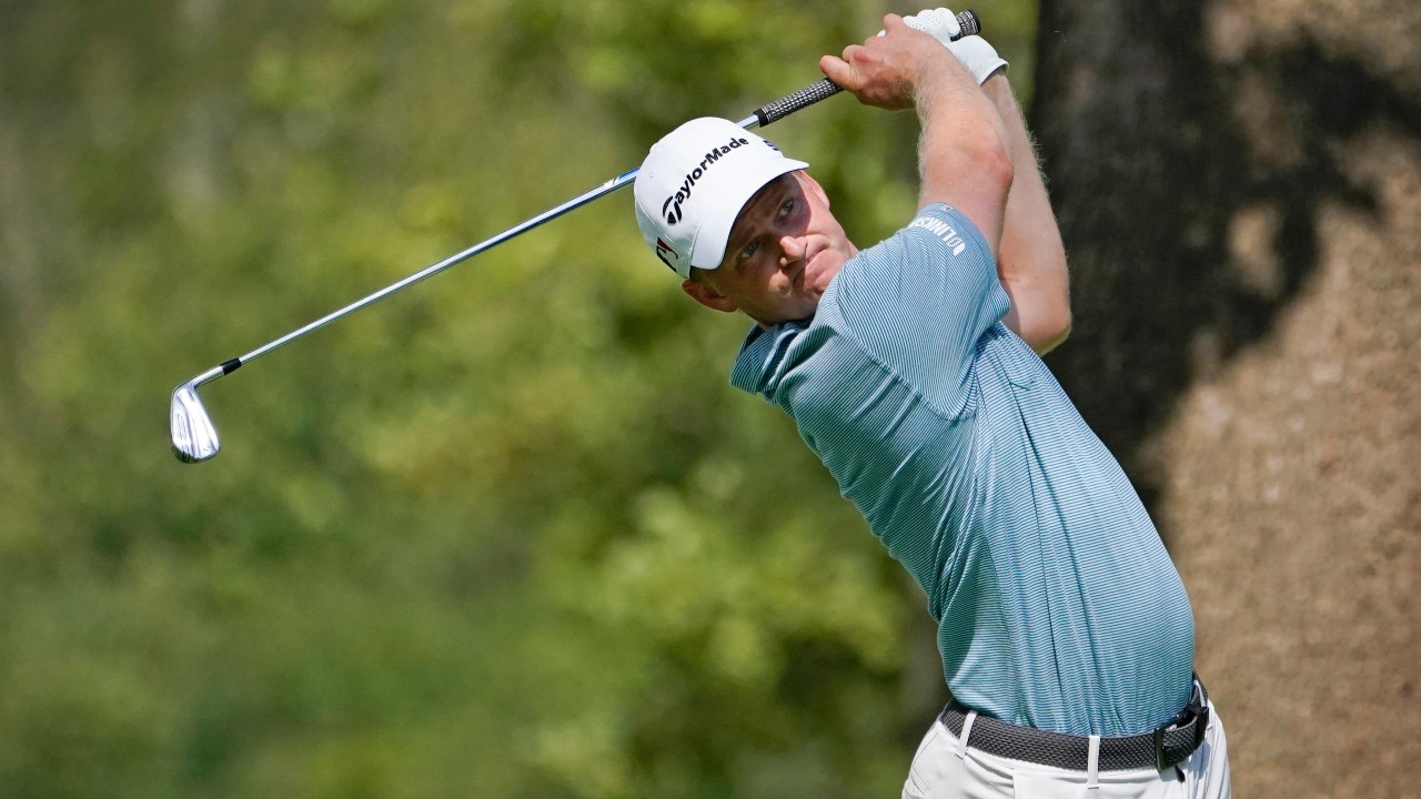 Adam Long hits from the 12th tee during the first round of the BMW Championship golf tournament. (Charles Rex Arbogast/AP)