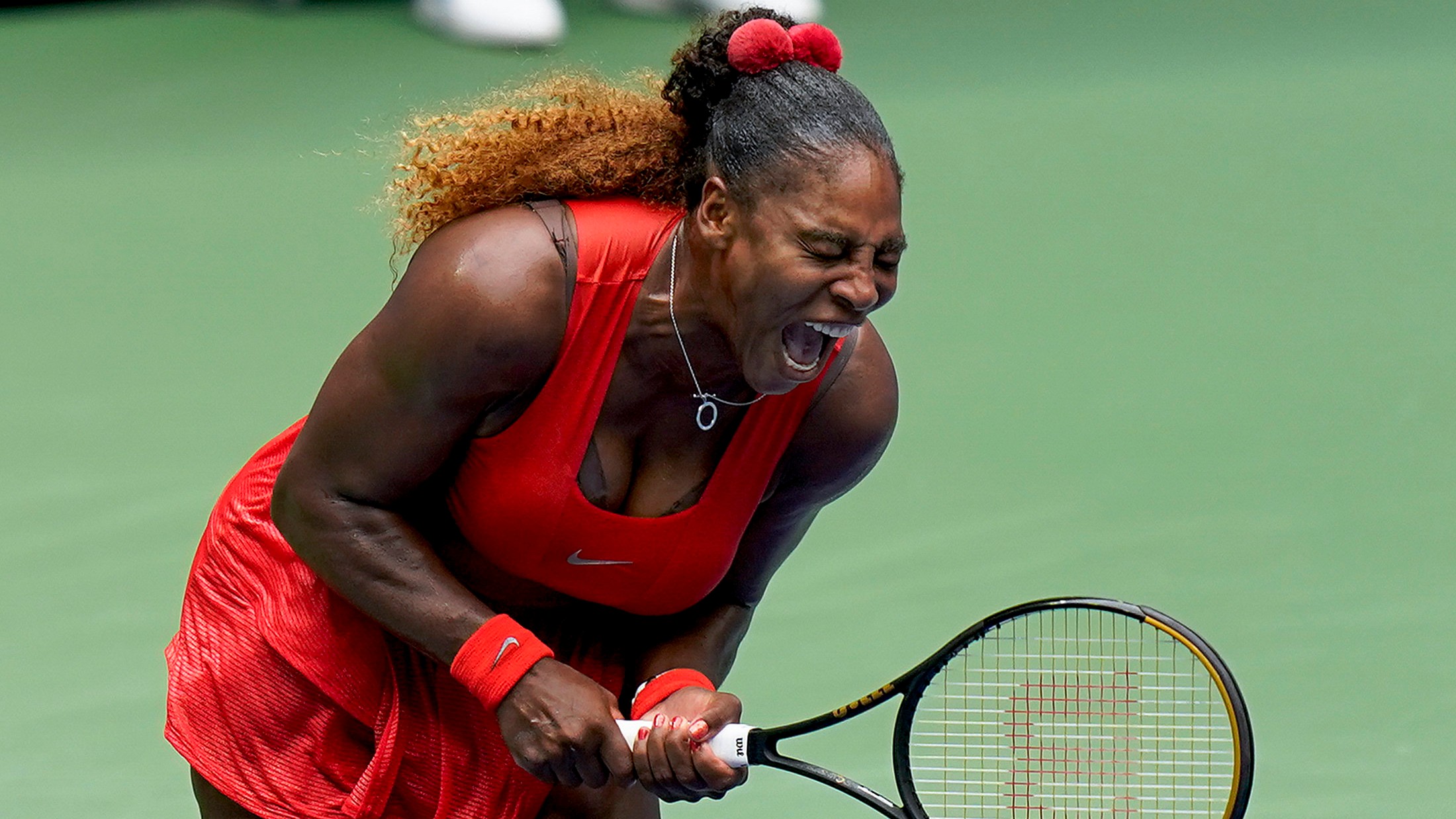 Serena Williams, of the United States, reacts during a match against Tsvetana Pironkova, of Bulgaria, during the quarterfinals of the US Open tennis championships. (Seth Wenig/AP)