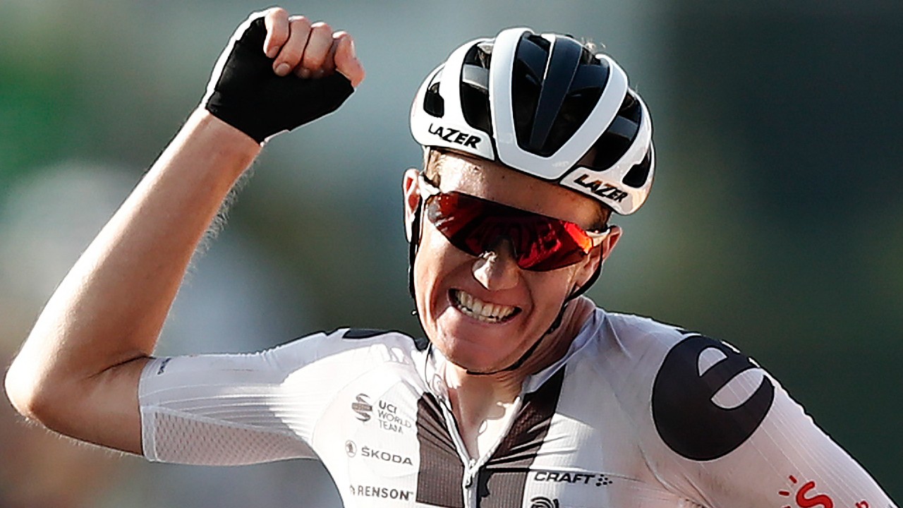 Denmark's Soren Kragh Andersen celebrates as he crosses the line to win the 19th stage of the Tour de France. (Benoit Tessier/Pool via AP)