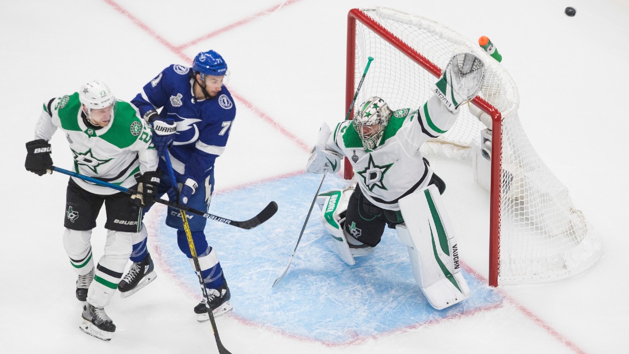 Dallas Stars goaltender Anton Khudobin (35) makes a save as Tampa Bay Lightning's Anthony Cirelli (71) and Stars' Esa Lindell (23) battle in front during second period NHL Stanley Cup finals action in Edmonton on Saturday, September 19, 2020. (Jason Franson/CP)