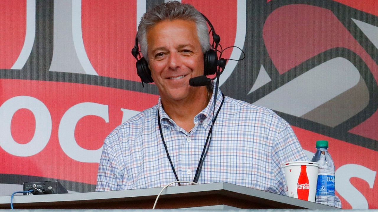  In this Sept. 25, 2019, file photo, Cincinnati Reds broadcaster Thom Brennaman sits in a special outside booth before the Reds' baseball game against the Milwaukee Brewers in Cincinnati. (John Minchillo / AP)
