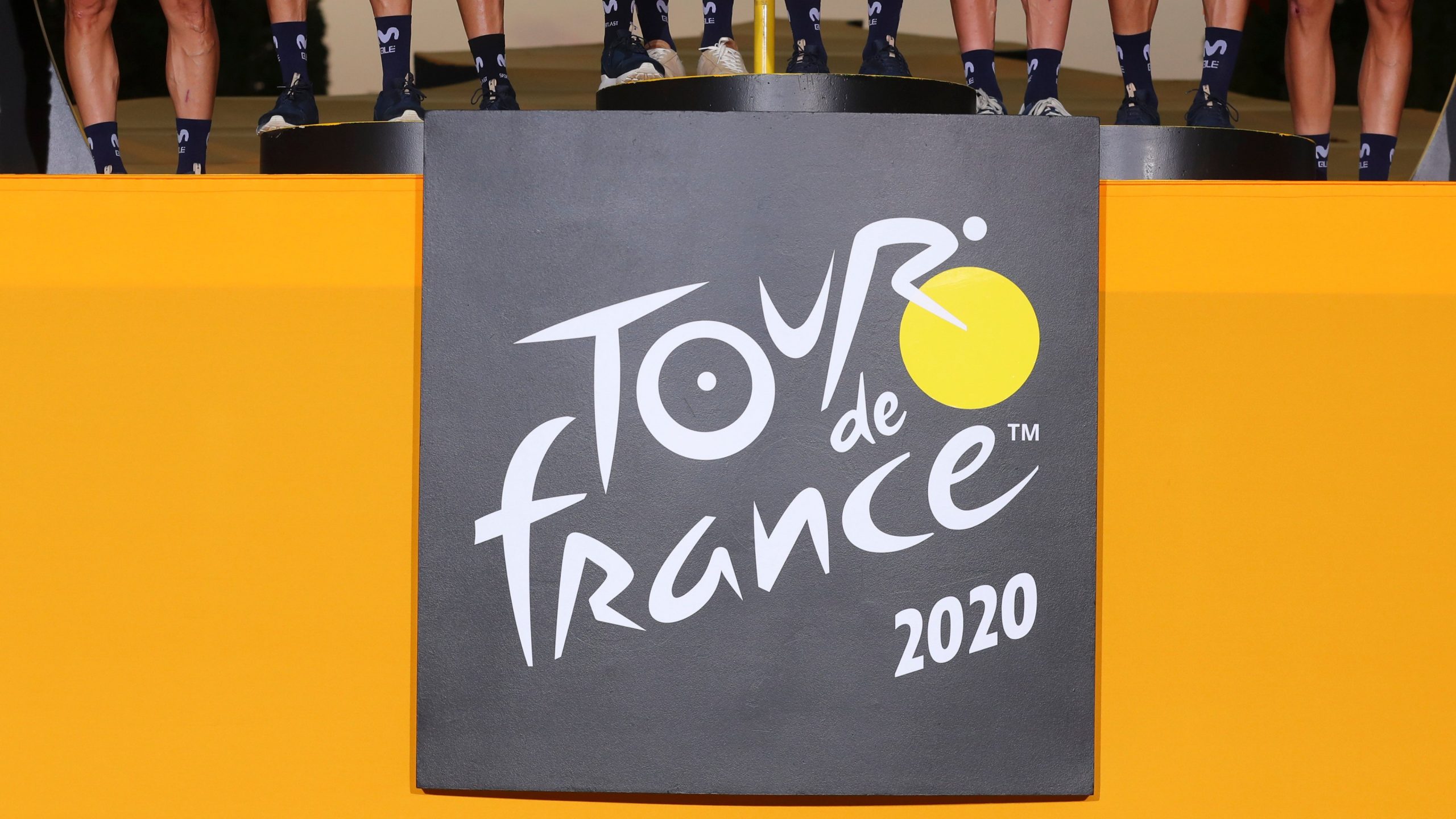 Best Team Movistar celebrates on the podium after the twenty-first and last stage of the Tour de France cycling race over 122 kilometers (75.8 miles), from Mantes-la-Jolie to Paris. (Thibault Camus/AP)