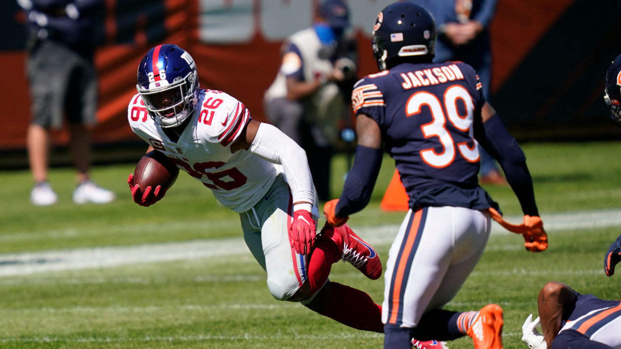 New York Giants running back Saquon Barkley (26) runs against the Chicago Bears during the first half of an NFL football game in Chicago, Sunday, Sept. 20, 2020. (Charles Rex Arbogast/AP)
