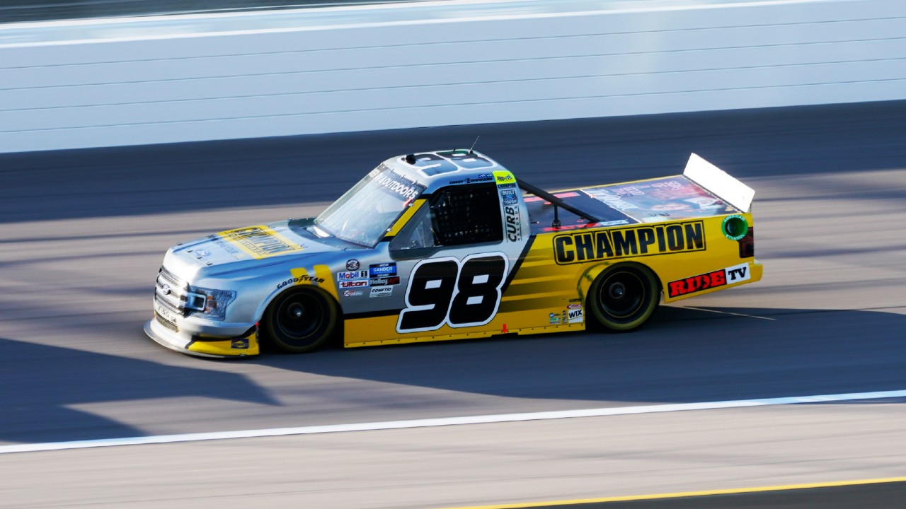 Grant Enfinger (98) drives during a NASCAR Truck Series auto race at Kansas Speedway in Kansas City, Kan., Friday, July 24, 2020. (Charlie Riedel/AP)