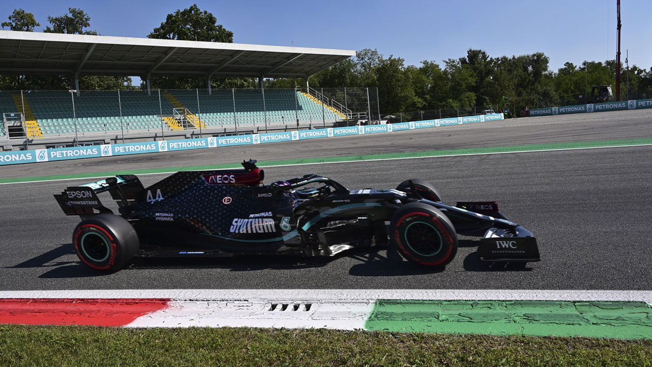 Mercedes driver Lewis Hamilton of Britain steers his car during the qualifying session at the Monza racetrack in Monza. (Miguel Medina/AP)