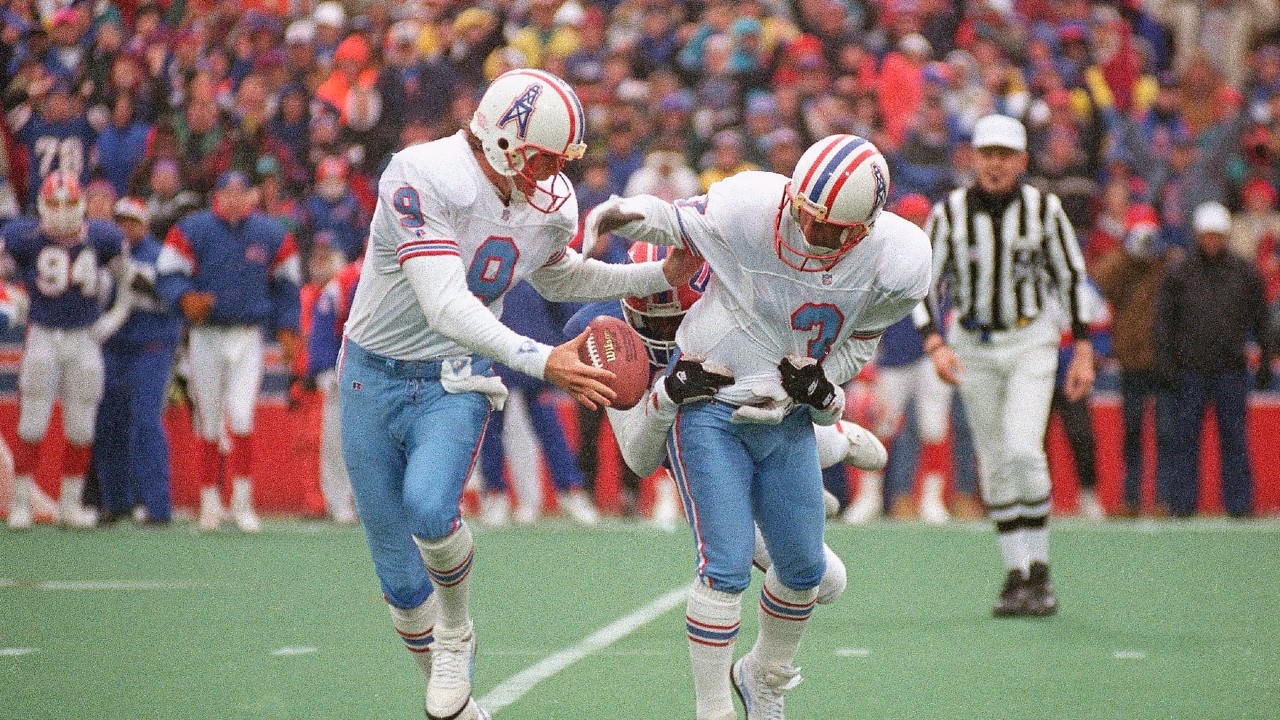 In this Jan. 3, 1993, file photo, Houston Oilers kicker Al Del Greco (3) and holder Greg Montgomery (9) juggle the ball after an aborted field goal attempt during the fourth quarter of their game against the Buffalo Bills, at Rich Stadium in Orchard Park, N.Y. (Bill Sikes/AP)